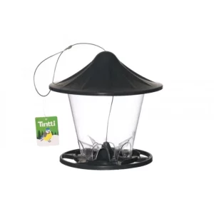 TINTTI JYVÄSYÖTIN HARMAA 23X23X23,5 CM jyväsyötin kuudella ruokinta-aukolla. Kestävä teräksinen ripustuslenkki syöttimen ripustamista varten.